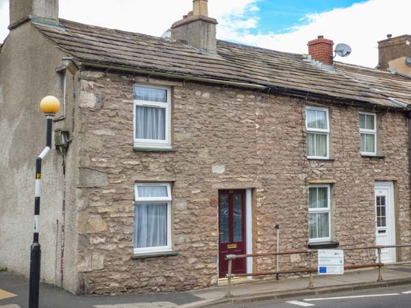 THE COTTAGE AT THE CORNER OF THE STREET